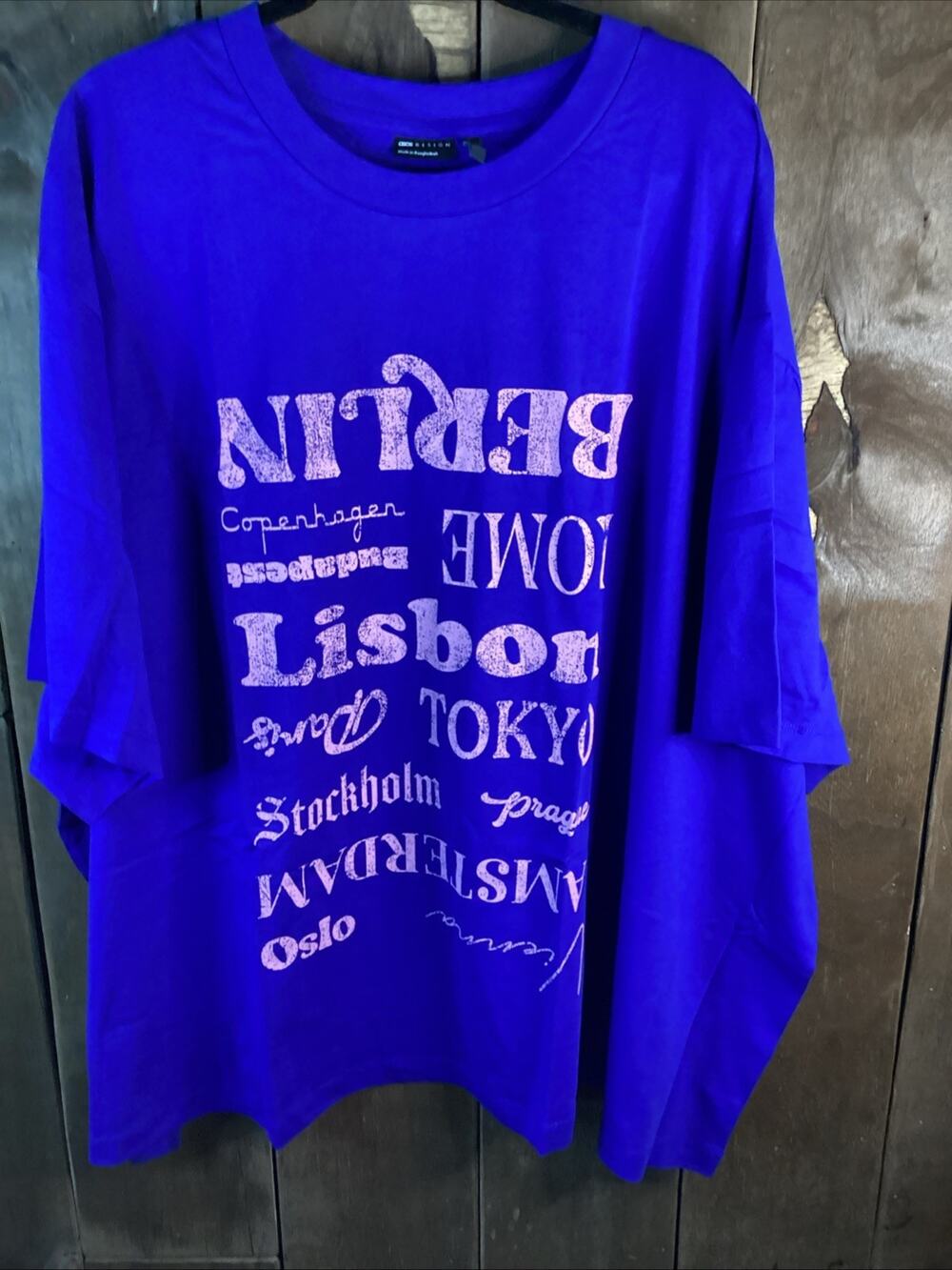 ASOS Design Curve Oversized T-Shirt With Locations Graphic In Blue 3XL